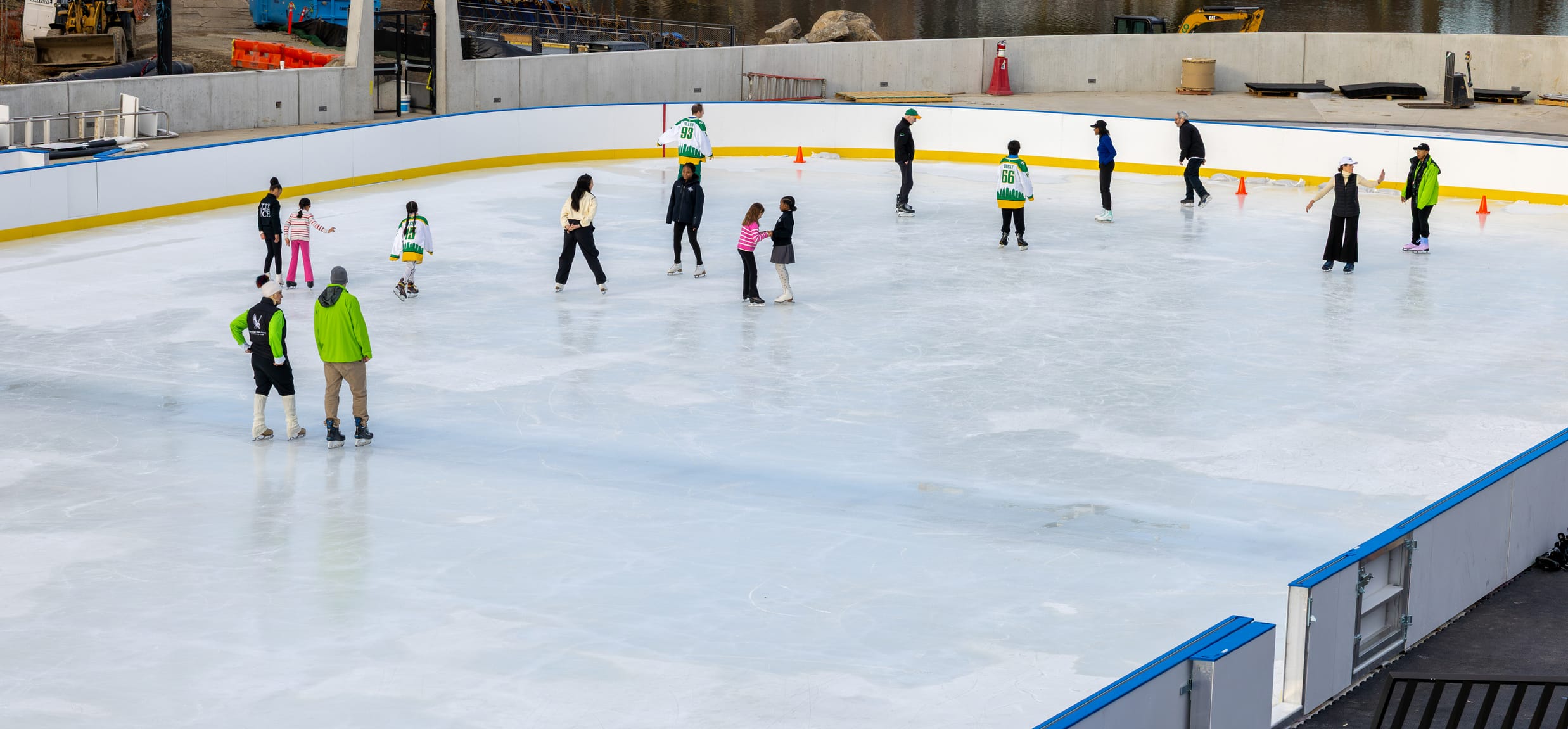 Park users skating on the new ice rink at the Davis Center at the Harlem Meer in Central Park