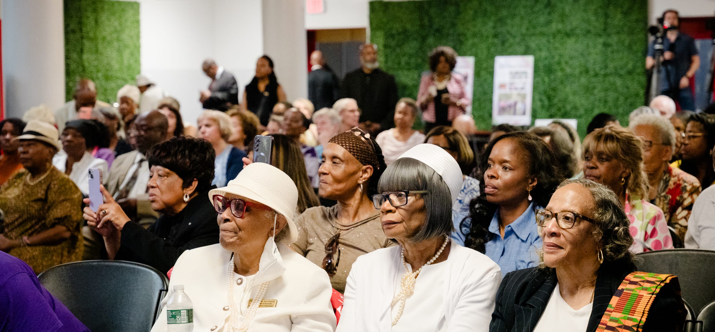 Members of the audience of the panel discussion in Mother AME Zion Church's social hall.